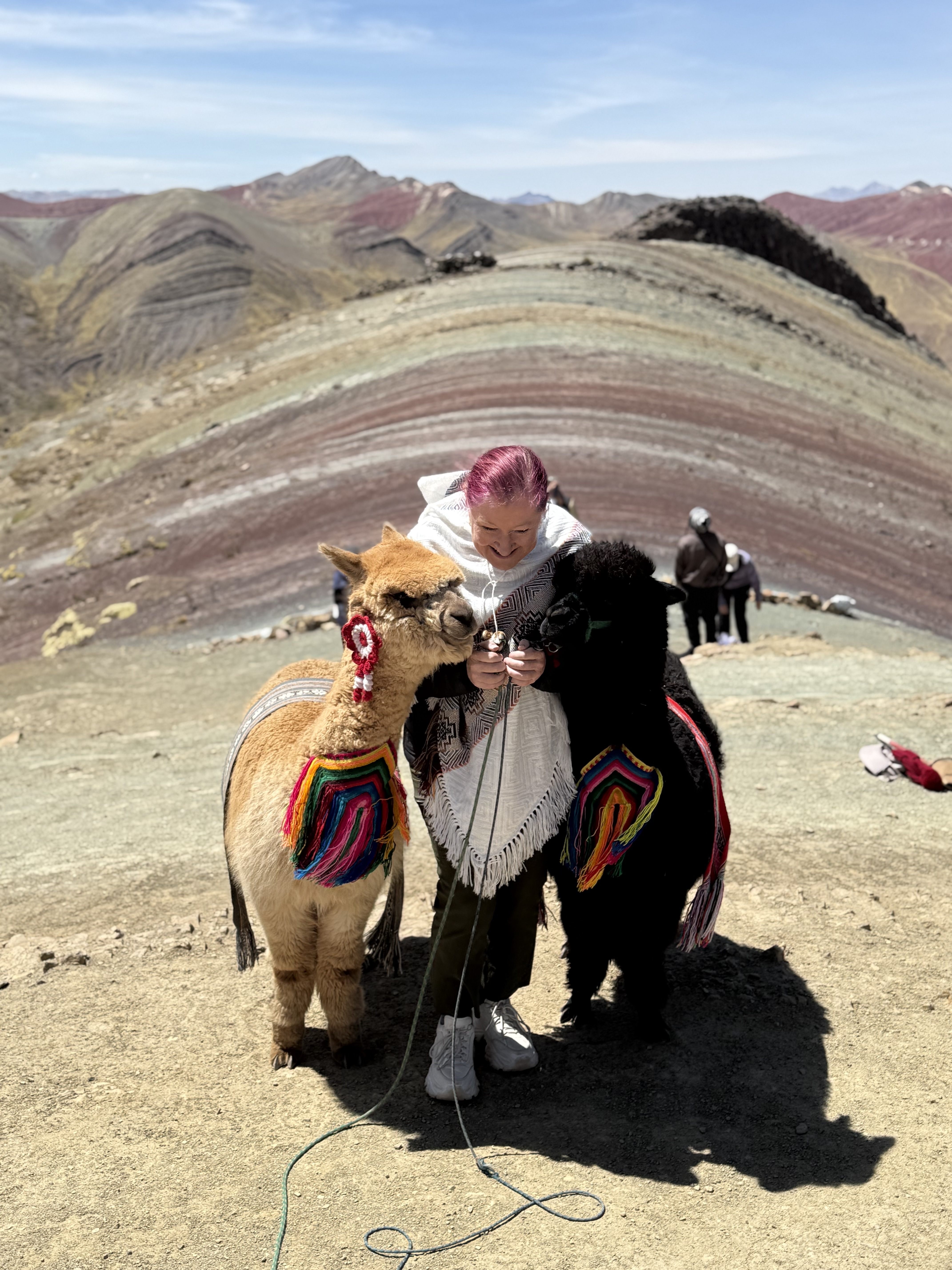 Peru_RainbowMountain_PaxWithLlamas_UGC_ChristineICampbell_InspiringSouthAmericaAndGalapagosSG_25-1